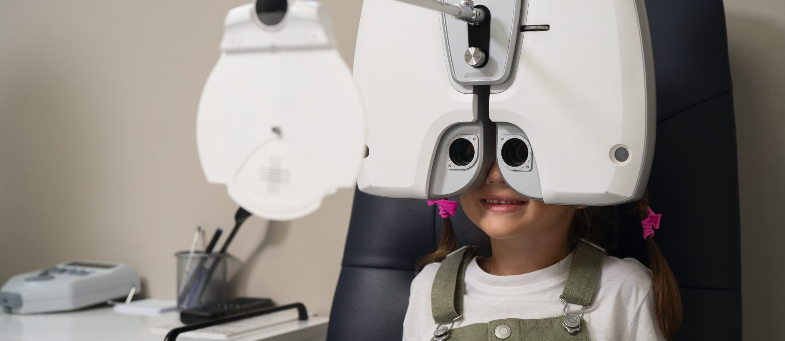 medium-shot-girl-getting-her-eyes-checked